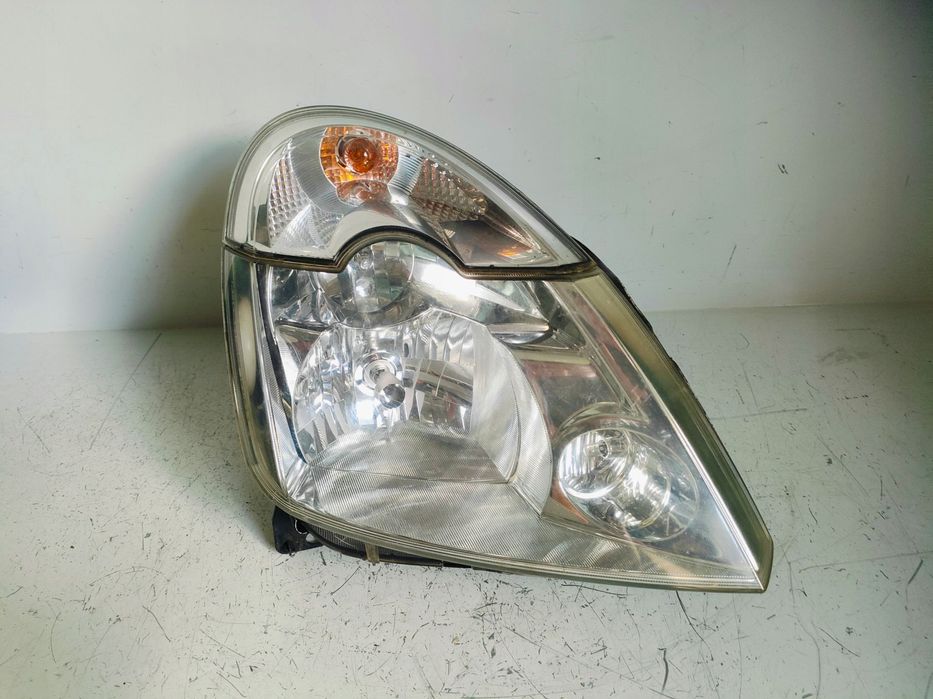 RENAULT MODUS 1,2B LAMPA PRAWY PRZÓD