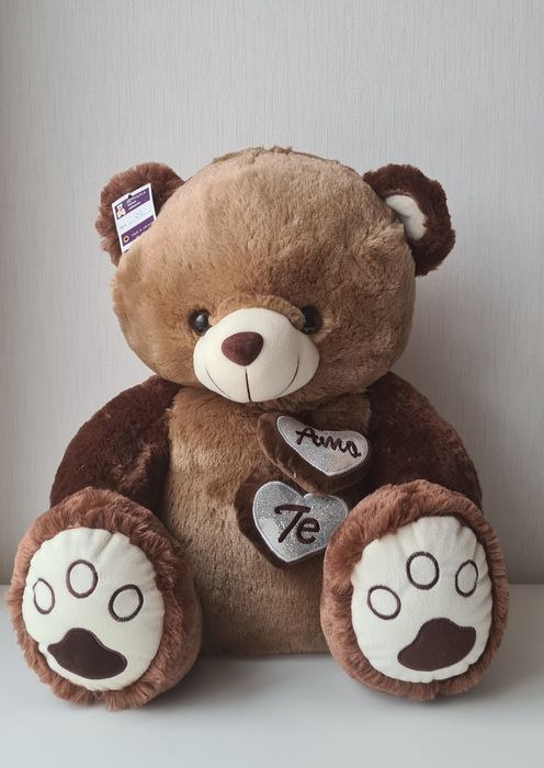 Великий плюшевий ведмедик