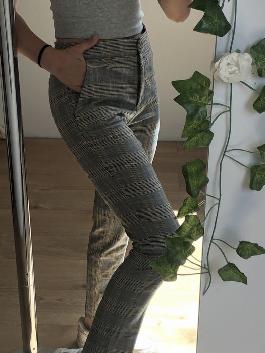 Szare spodnie w kratę Zara