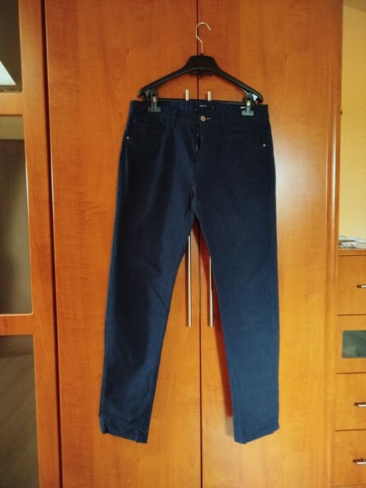 Męskie spodnie Reserved rozmiar 34