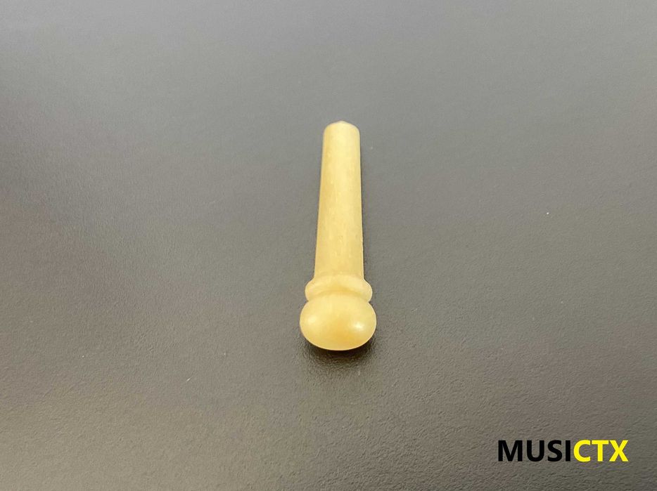 Pins em osso para guitarra folk