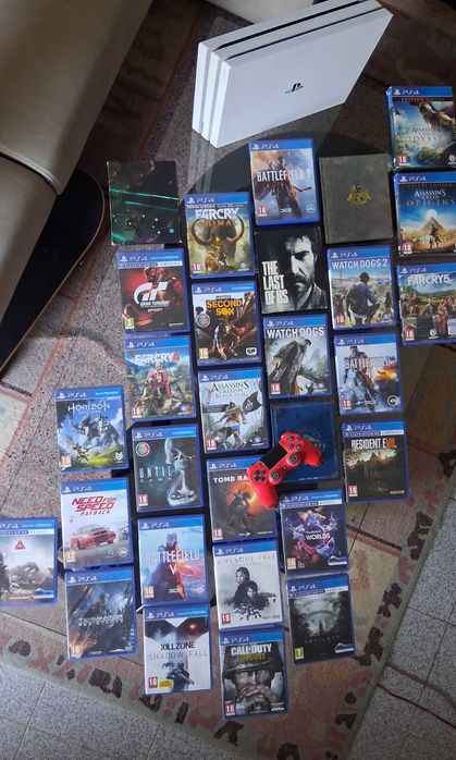 PS4 Pro branca + comando + 30 jogos