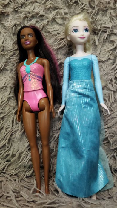 Продам куклы барби .