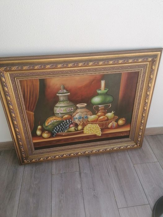 Quadro muito bonito com uma moldura dourada. 1,10 /0,90