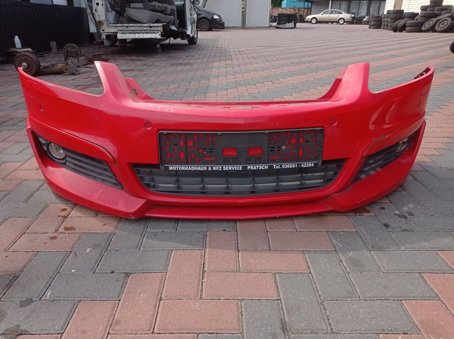 Бампер передній задній Opel Zafira B Astra h  Опель зафіра