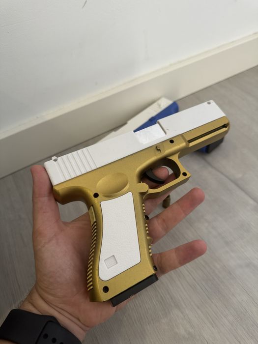 Arma de brincar estilo Glock