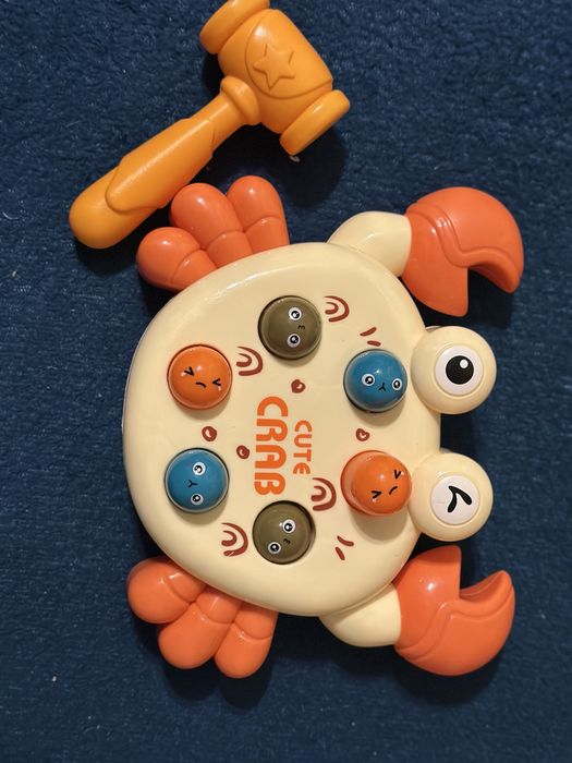 Стучалка, механічна іграшка