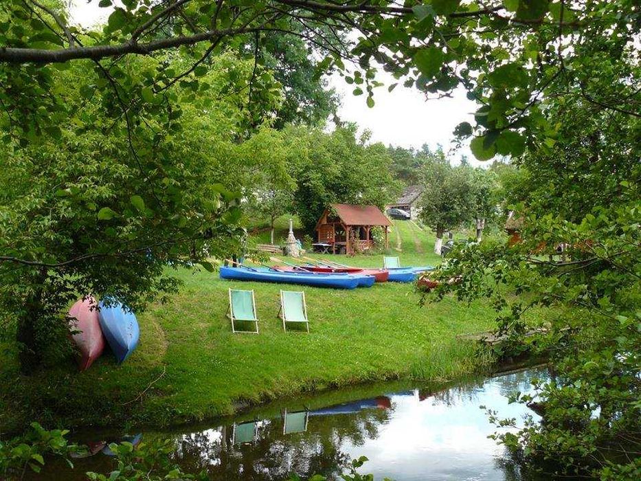 Domek nad wodą w sercu Puszczy Noteckiej – idealne miejsce na wypoczynek i spływy kajakowe!