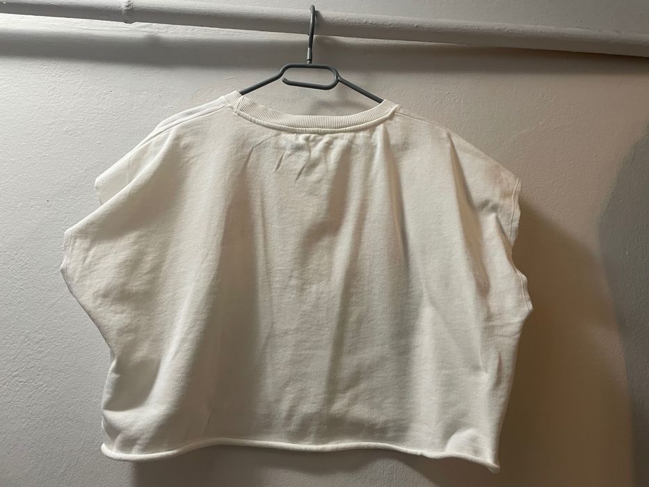 Luźna koszulka biała rozmiar M-XL do pępka