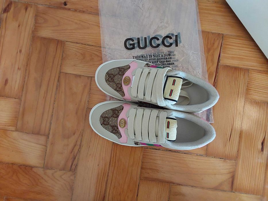 Sapatilhas Gucci.