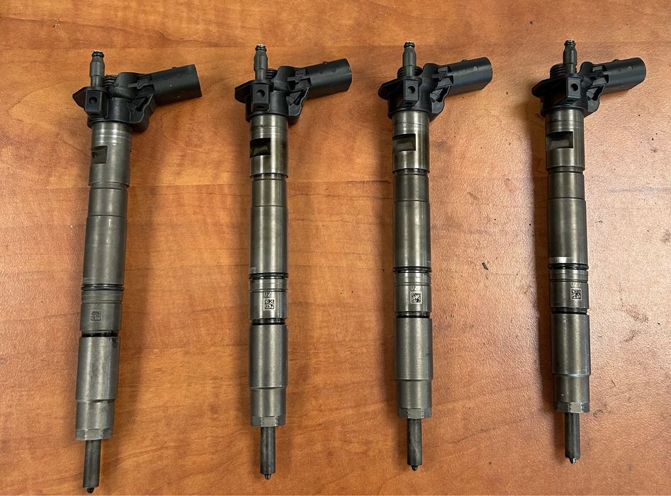 Форсунка Vw Skoda Audi 2.0TDI VAG 03L130277 0445116030