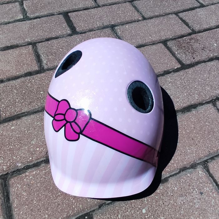 Kask rowerowy dziewczęcy B'TWIN, różowy w groszki z kokardą, 48-52 cm
