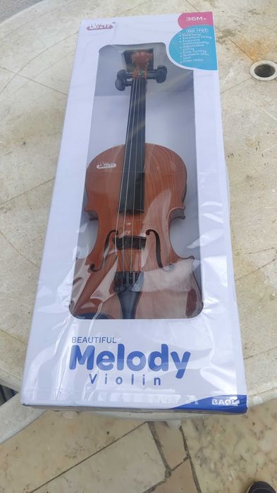 Violino de plástico para criança