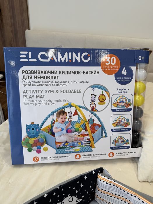 Розвиваючий килимок з дугами брязкальцями El Camino ME 1171 Gray