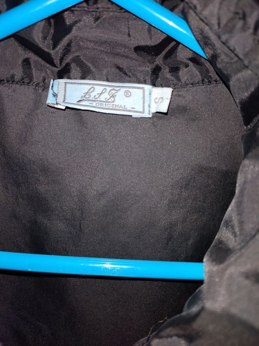 Casaco corta vento/ chuva