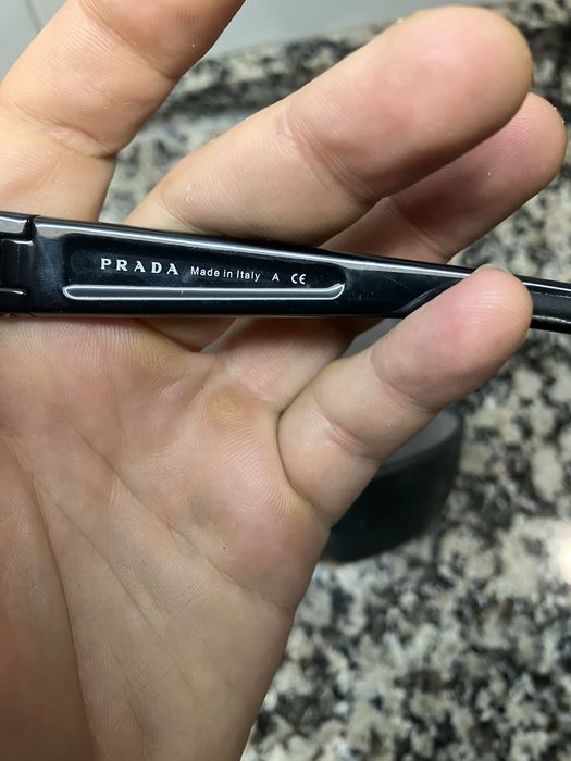 Óculos escuros Prada