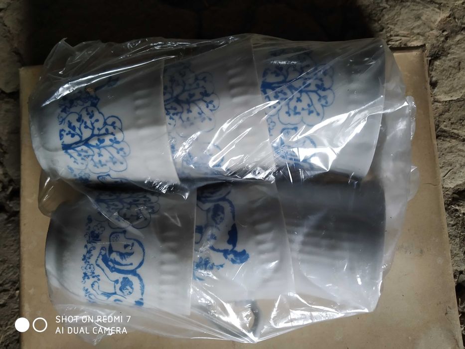 Набір керамічних чашок.