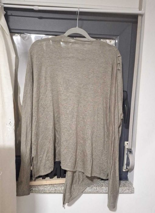 Casaco cinzento de malha