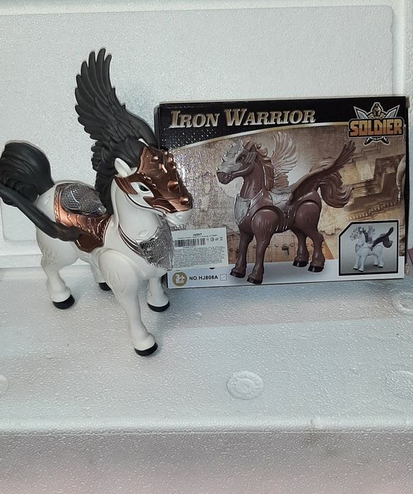 Игрушка  музыкальная  - лошадка  Пегас