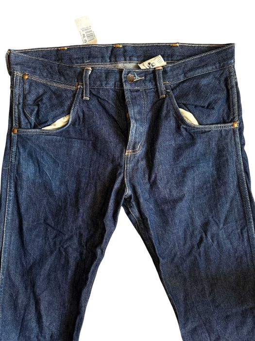 Stylowe męskie dżinsy casual style szeroką nogawka Wrangler W32 L32.