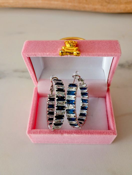 Srebrne kolczyki kola z szafirami