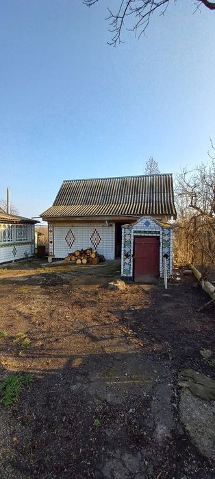 Будинок з прямим виходом до р. Роська
