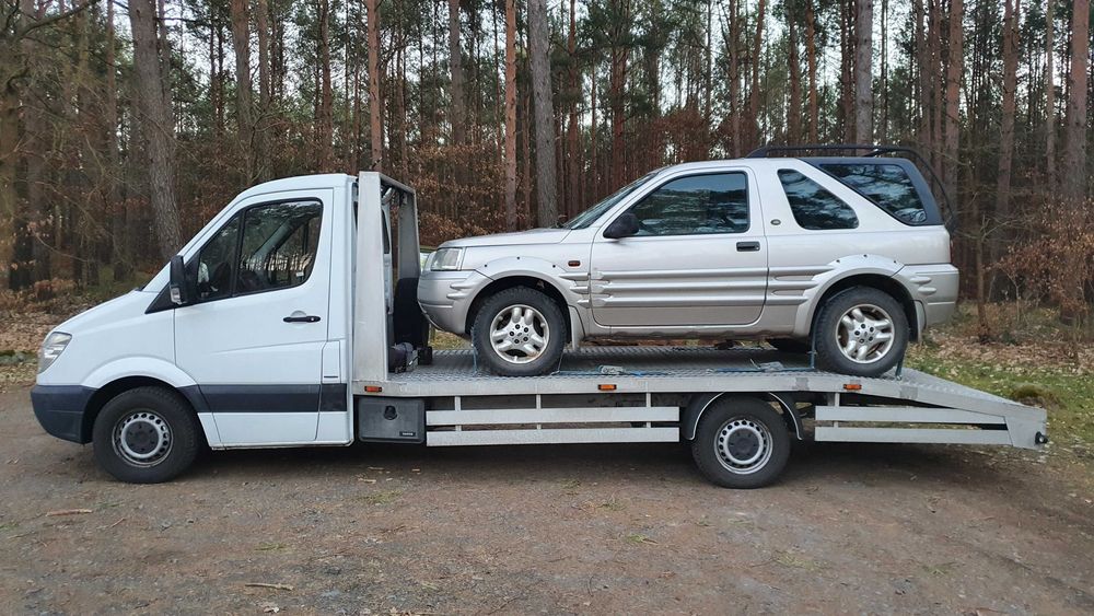 Laweta, parking, pomoc drogowa, assistance, holowanie, odpalanie.Tanio