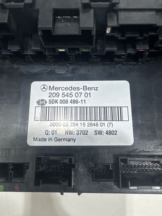 Sam tras Mercedes Benz W209