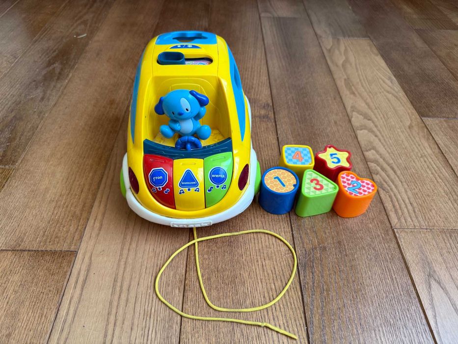 Розвивальна машинка-сортувальник із фігурками та музикою