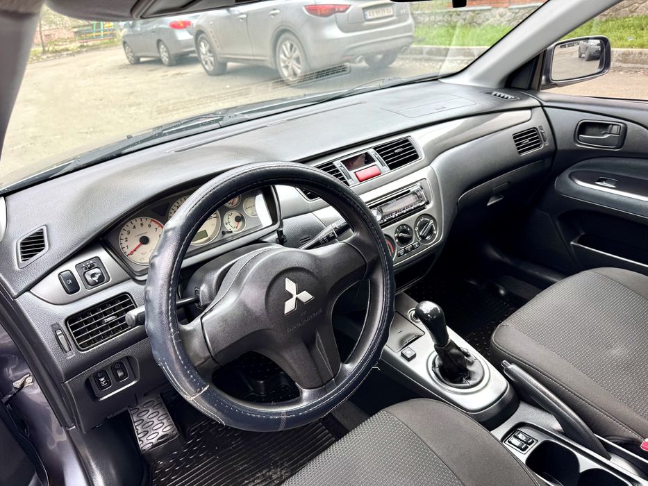 Продам Митсубиси Лансер