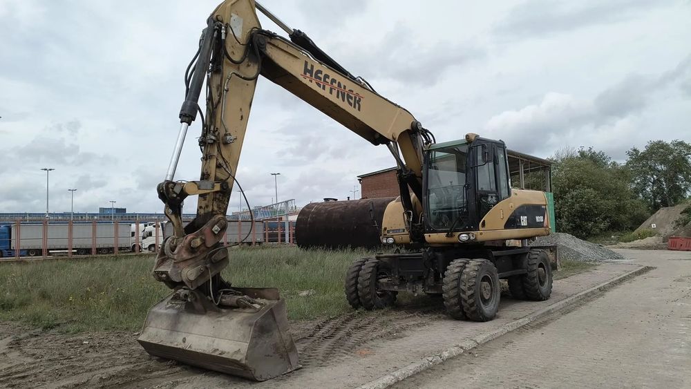 Caterpillar M 318D  Koparka CAT M318D