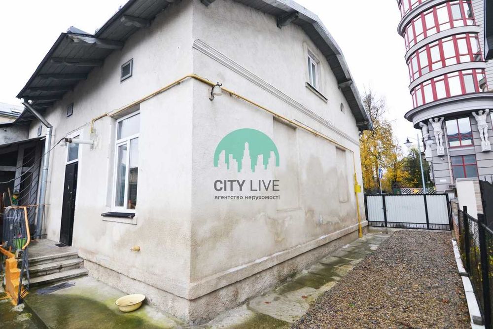 Будинок в центрі міста з земельною ділянкою! Під житло чи бізнес(1)
