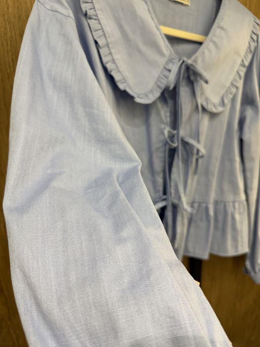 Блуза з рюшами