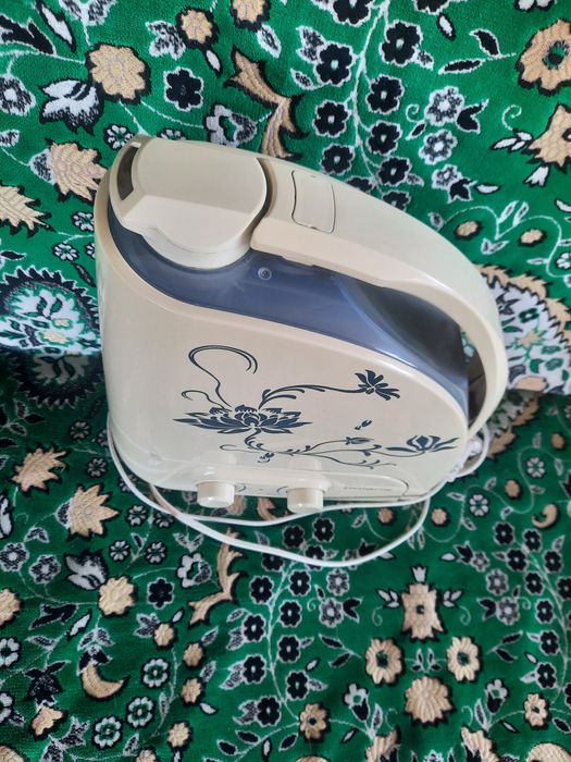 Паровой увлажнитель и очиститель воздуха  Polaris.