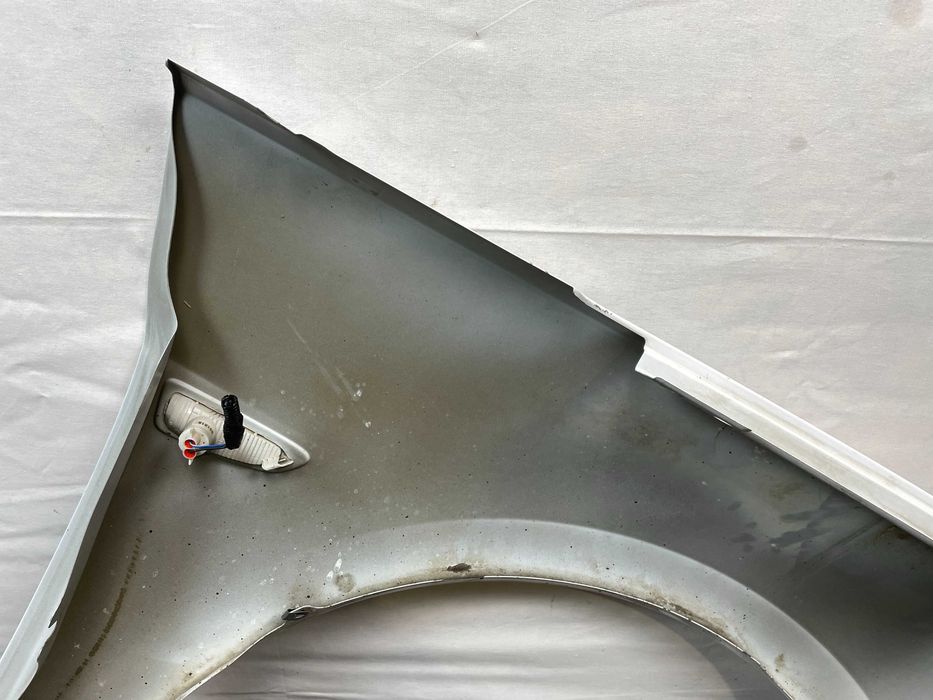 Błotnik przód przedni lewy opel astra v k kod lakieru: y40r 2015-