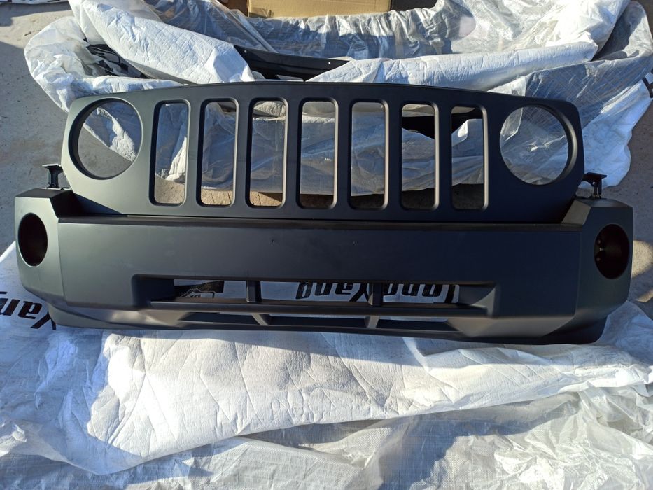 Бампер передний Jeep Patriot 2008-11. 68021299AB