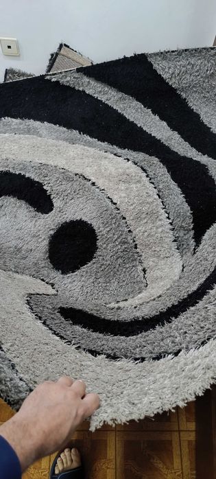 2 tapetes de sala no estado que estão