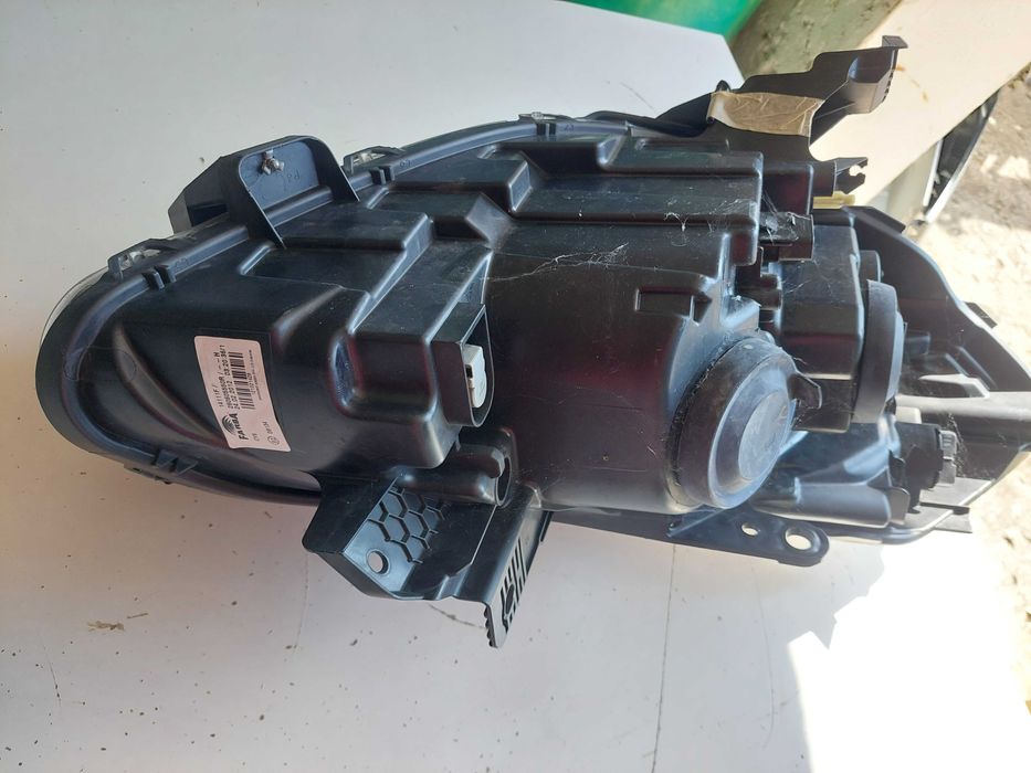 farol esq Renault clio 3