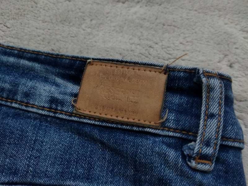Spodnie jeansowe damskie Reserved. Rozmiar 40. Dziury przetarcia