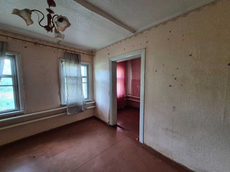 Продам 1\2 частина будинку м. Зміїв