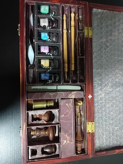 Conjunto de escrita antigo