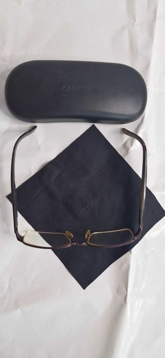 Sprzedam okulary męskie prostokątne Carrera w brązowych oprawkach.