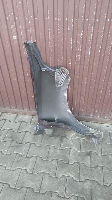 ) Lancia Ypsilon błotnik przedni lewy