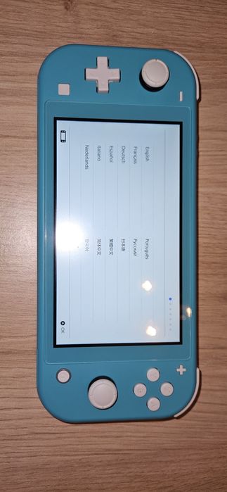 Nintendo Switch Lite + EXTRAS