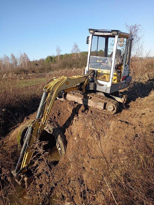 Usługi koparkol cenny od 80 zł traktor z przyczepol