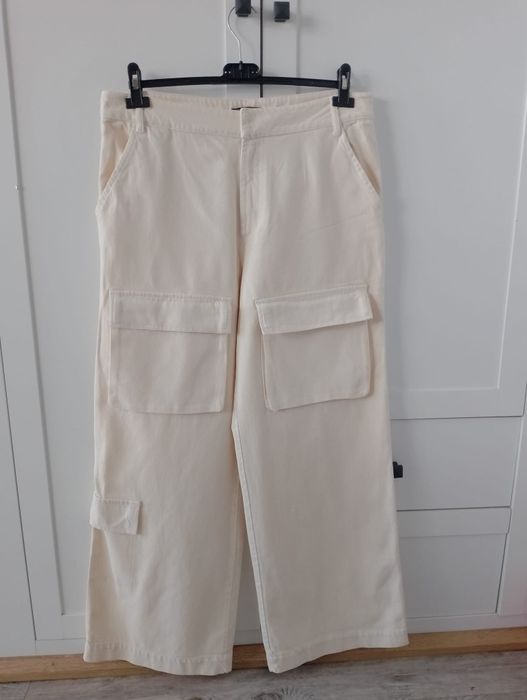 Nowe jeansy szerokie nogawki 44