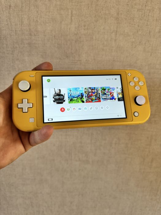 Безкоштовні ігри Nintendo switch lite + sd 128 + 10 ігор ігрова консоль