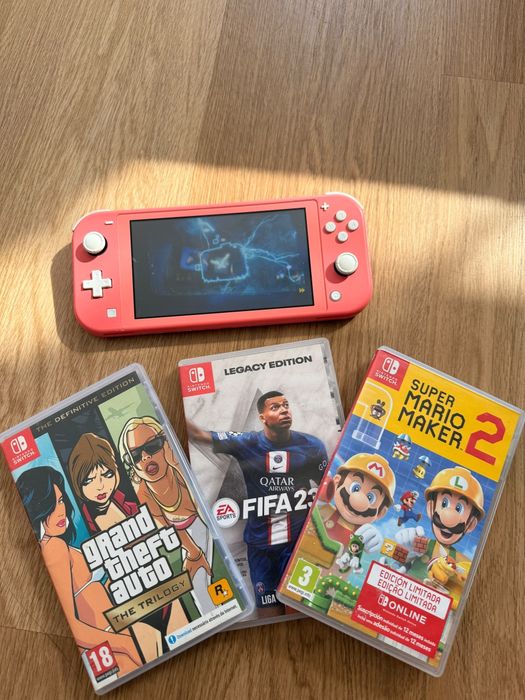 Nintendo Switch Lite + 3  jogos