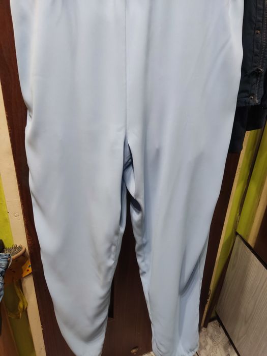 Kombinezon elegancki błękitny pióra XL