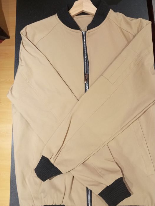 Casaco corta-vento castanho64751812454402124